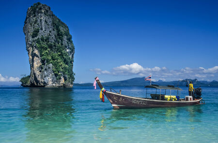 Longtail boat on tropical beachのeditorial素材