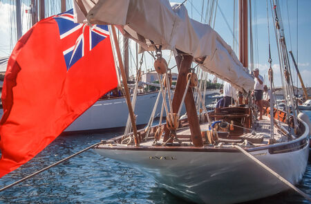 Sailing yacht with the English flag in Saint Tropez, Cote Azur, Franceの写真素材