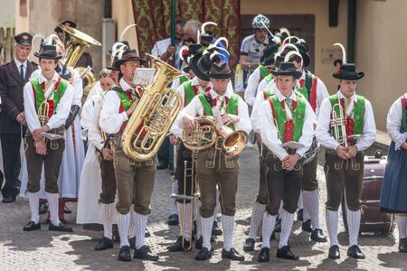 Traditional brass band at the Sacred Heart Procession in Lengstein at Renon, South Tyrol, Italyのeditorial素材