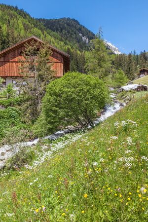 Alpine Hut and mountain stream in South Tyrol, Italyのeditorial素材