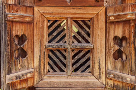 Old window at a hutの写真素材