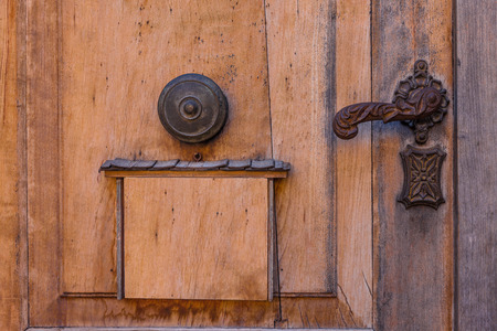 Church door at the monastery Saeben above Klausen, South Tyrol, Italyの写真素材