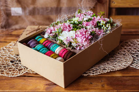 Flowers and macaroon in the boxの写真素材