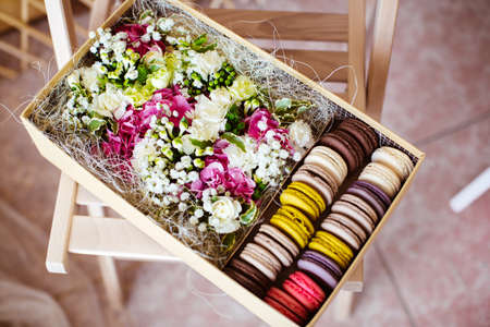 Flowers and macaroon in the boxの写真素材