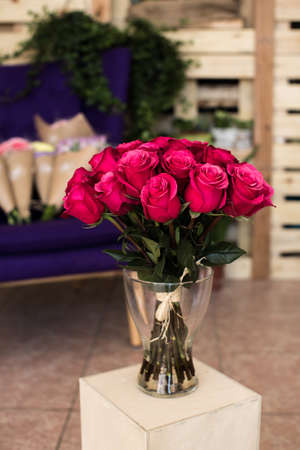 Bouquet of roses in a glass vaseの写真素材