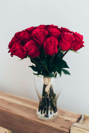 Bouquet of roses in a glass vaseの写真素材