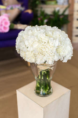 Bouquet of carnation flowers in glass vaseの写真素材