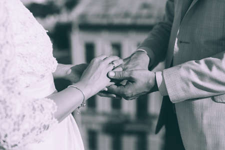 Closeup view of married couple holding handsの写真素材