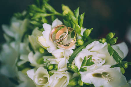 wedding bouquet and wedding ringsの写真素材