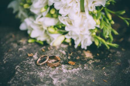 wedding bouquet and wedding ringsの写真素材