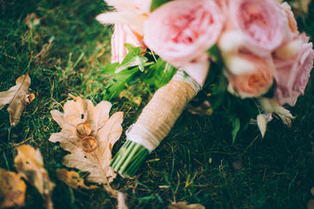 wedding bouquet and wedding ringsの写真素材