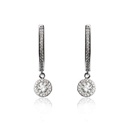 Pair of diamond earrings, isolated on whiteの写真素材