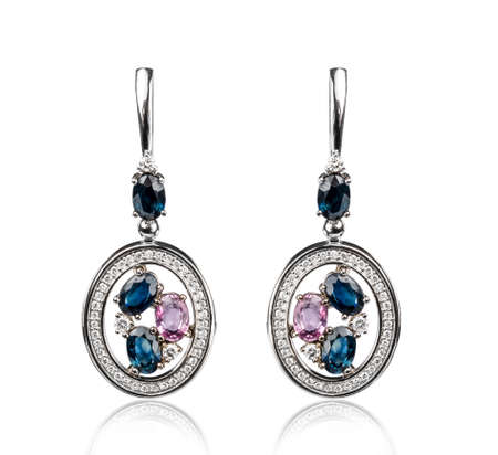 Pair of diamond earrings, isolated on whiteの写真素材
