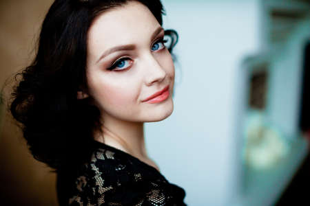 Beautiful girl in a sexy lingerie on a sofaの写真素材