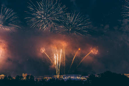Fireworks over the city of St. Petersburg (Russia) on the feast of Scarlet Sails, in the rain with...
