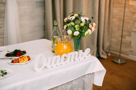 Table setting at a luxury wedding reception.の写真素材
