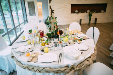 Beautiful wedding table with wedding decor. Birch. In bossage style