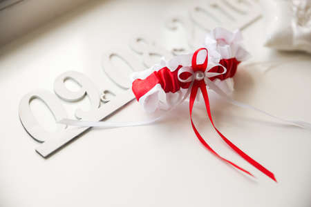 Wedding details. Bridal accessories. perfume, jewelry and rings. Selective focusの写真素材