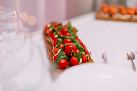 Banquet table full of fruits and berries - catering eventの写真素材