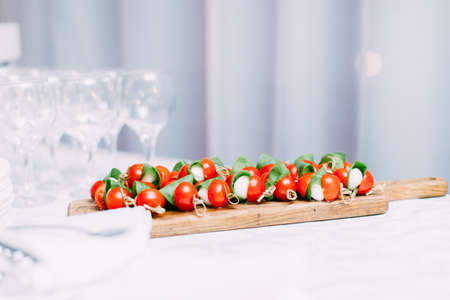Banquet table full of fruits and berries - catering eventの写真素材