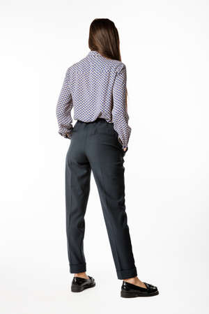 Details of women's clothing. Women's pants model on a white backgroundの写真素材