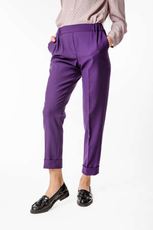 Details of women's clothing. Women's pants model on a white backgroundの写真素材