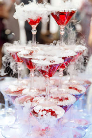 Champagne glass pyramid. Pyramid of glasses of wine, champagne, tower of champagneの写真素材