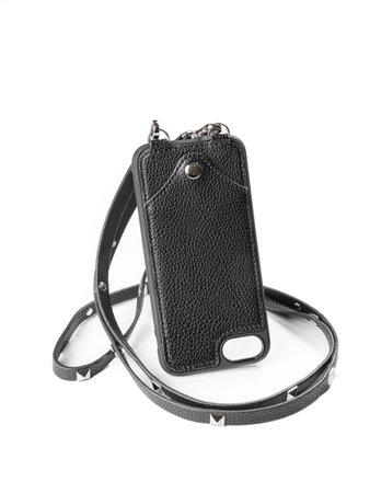Black leather case for phone isolated on white backgroundの写真素材
