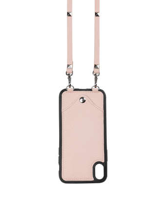 Pink leather case for phone isolated on white backgroundの写真素材