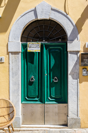 wooden door in an italien villageのeditorial素材