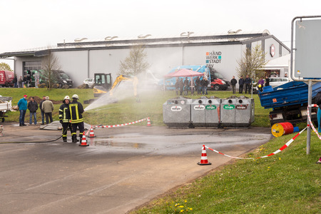 Fireman demonstrate how to handle hazardous material - public demonstration May 2017 in Bleialf, Eifel, Rheinland-Pfalz, Germany, Europe, EUのeditorial素材