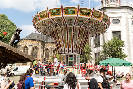 KORNELIMUENSTER, GERMANY, 18th June, 2017 - People browse the historic fair of Kornelimuenster on a sunny warm day. The fair is held annually in the historic old town of Kornelimuenster near Aachen for four days. It attracts a large number of people. Credのeditorial素材
