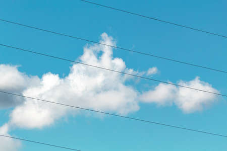 White cloud in the blue sky of a sunny day