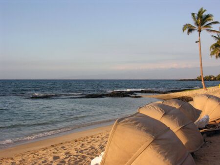 Big Island Hawaii resort beach view with cabanasの写真素材