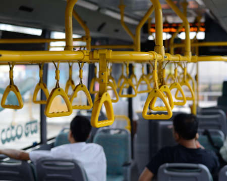 Straps to  hold to maintain balance in a commuter busの写真素材