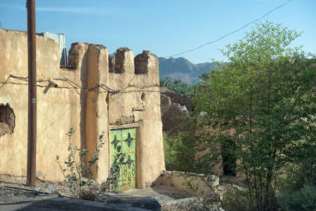 Delerict old earthen houses in ruinの写真素材