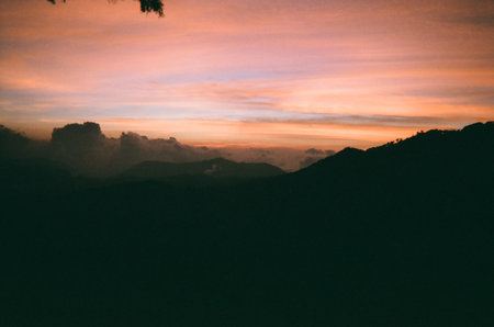 Sunset in the mountains. Beautiful landscape of the mountains at sunset. Captured with analogue cameraの写真素材
