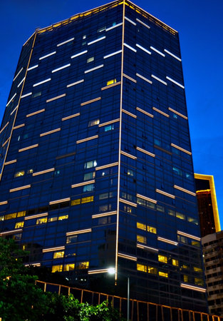 Macau - Modern hotel building at nightの写真素材