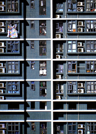 Macau - abstract image of the facade of a modern building with windows and balconiesの写真素材