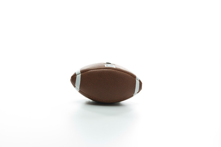 american football isolated on white backgroundの写真素材