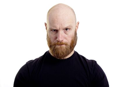 angry evil man with bad thoughts isolated on white backgroundの写真素材