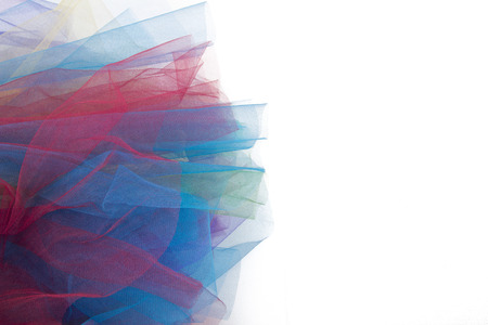 tulle fabric colorful isolated on white backgroundの写真素材