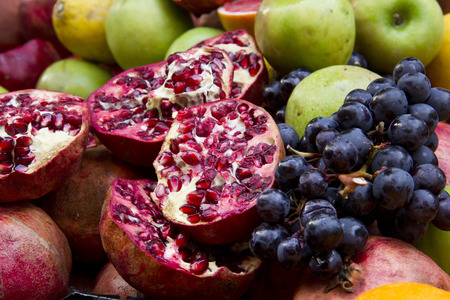 pomme granate grapes and apples close upの写真素材