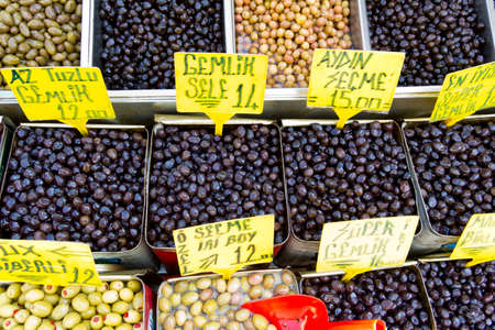 black and green olives on marketの写真素材