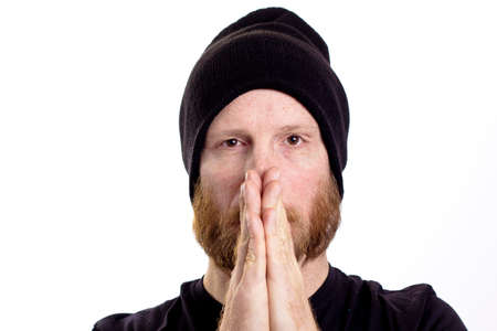 surprised man hands in face isolated on white backgroundの写真素材