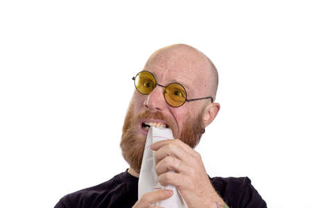 man at work gets crazy, too much work isolated on white backgroundの写真素材