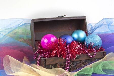 christmas tree decoration balls garment in a box isolated on white background
