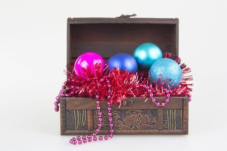 christmas tree decoration balls garment in a box isolated on white backgroundの写真素材