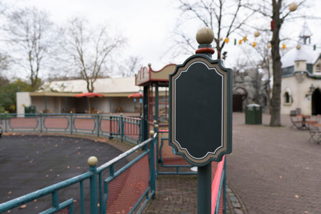 Blank warning sign in an empty park like abandoned.の写真素材