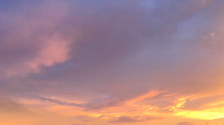Pinkish tuff-of-cotton-wool-like clounded sky  in beautiful sunsetの写真素材